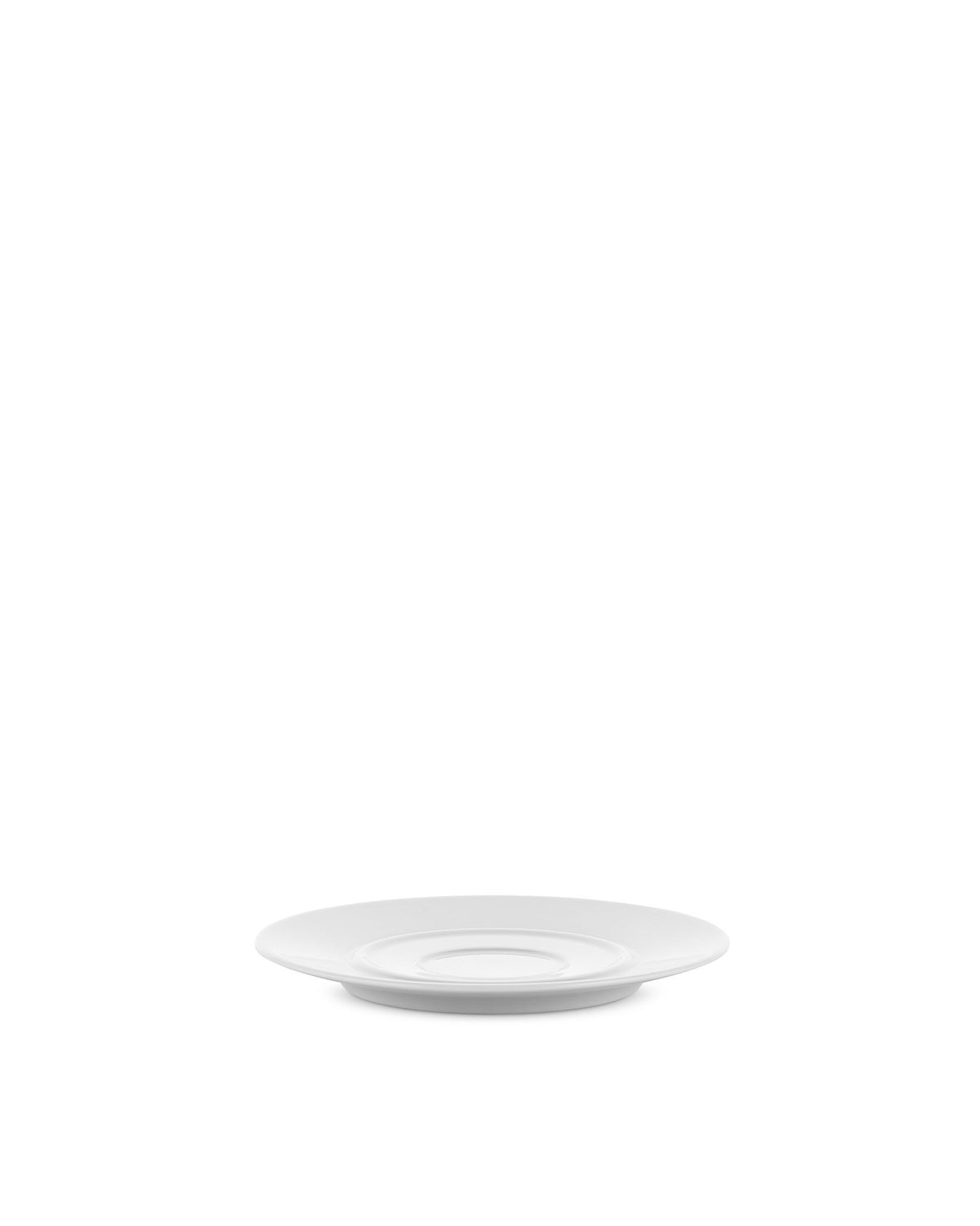White round saucer by Alessi with a subtle raised center for a cup, isolated on a white background.