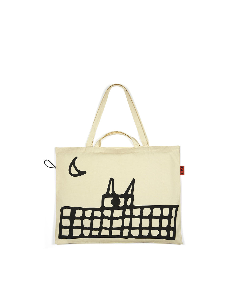 Cream-colored XL tote bag by Alessi with a black cat and building illustration and a red side tag.