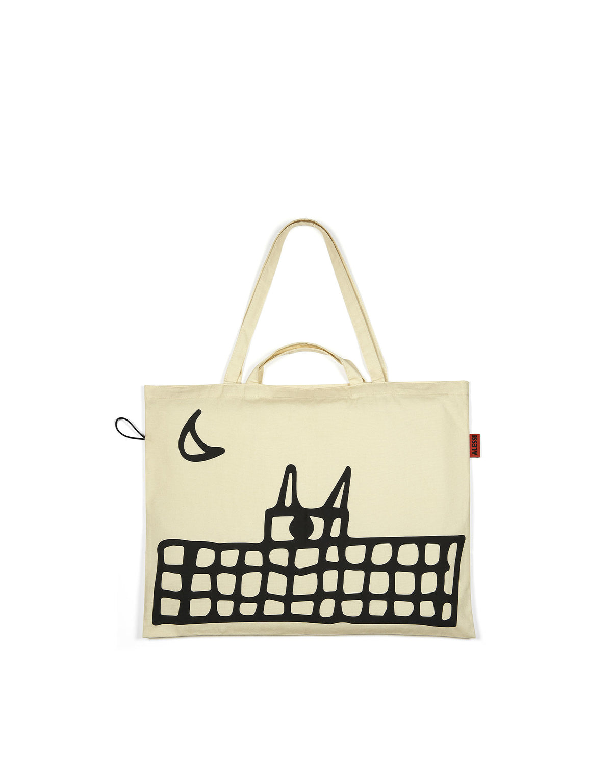 Cream-colored XL tote bag by Alessi with a black cat and building illustration and a red side tag.