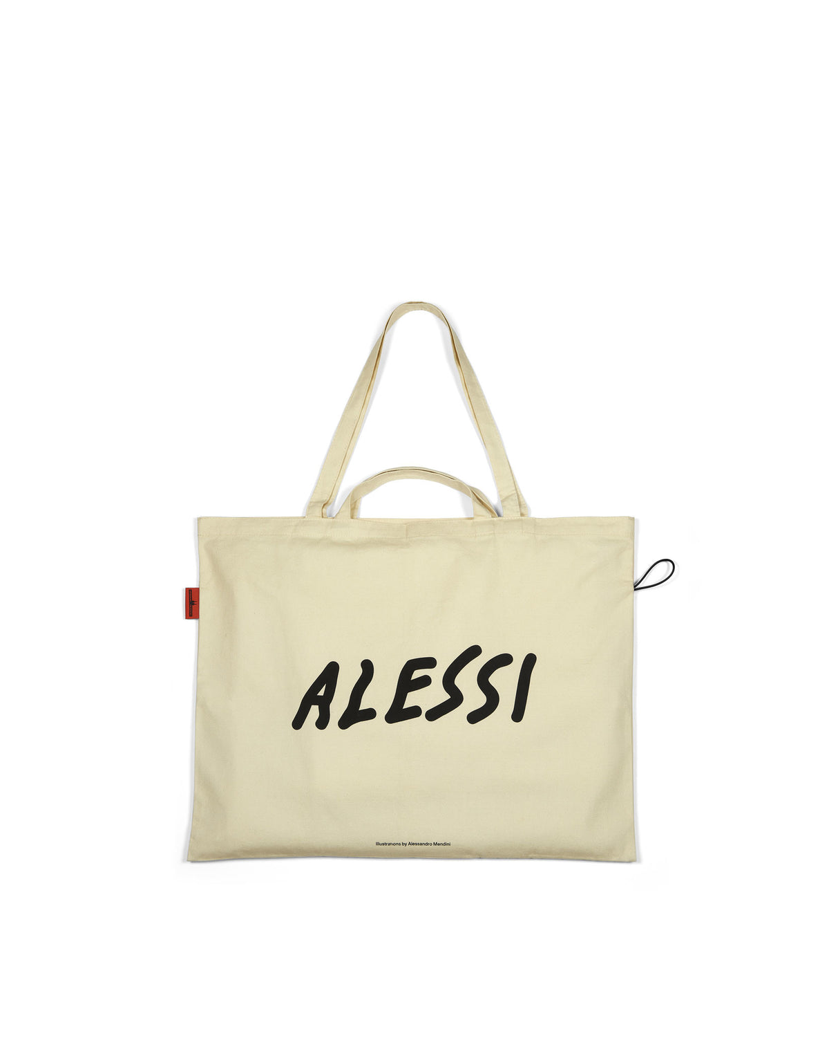 Cream fabric tote bag XL by Alessi, featuring a black "ALESSI" logo, "illustrations by Alessandro Mendini" text, a red side tag, and a black loop.