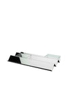 Reflective V-shaped tray by Alessi, made of silver-toned metal with a black end and clear glass compartment.