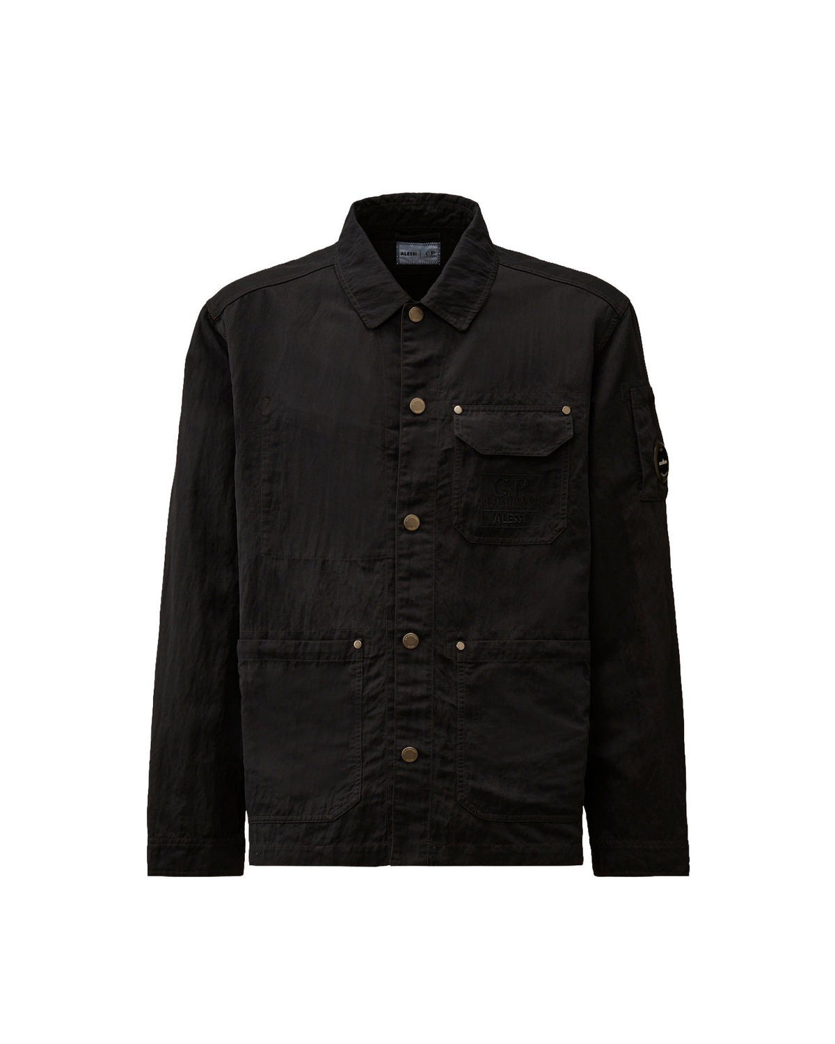 Black textured jacket by Alessi with collared neckline, button front, utility pockets including a chest pocket with 'C.P. Company ALESSI' text, and sleeve lens detail.