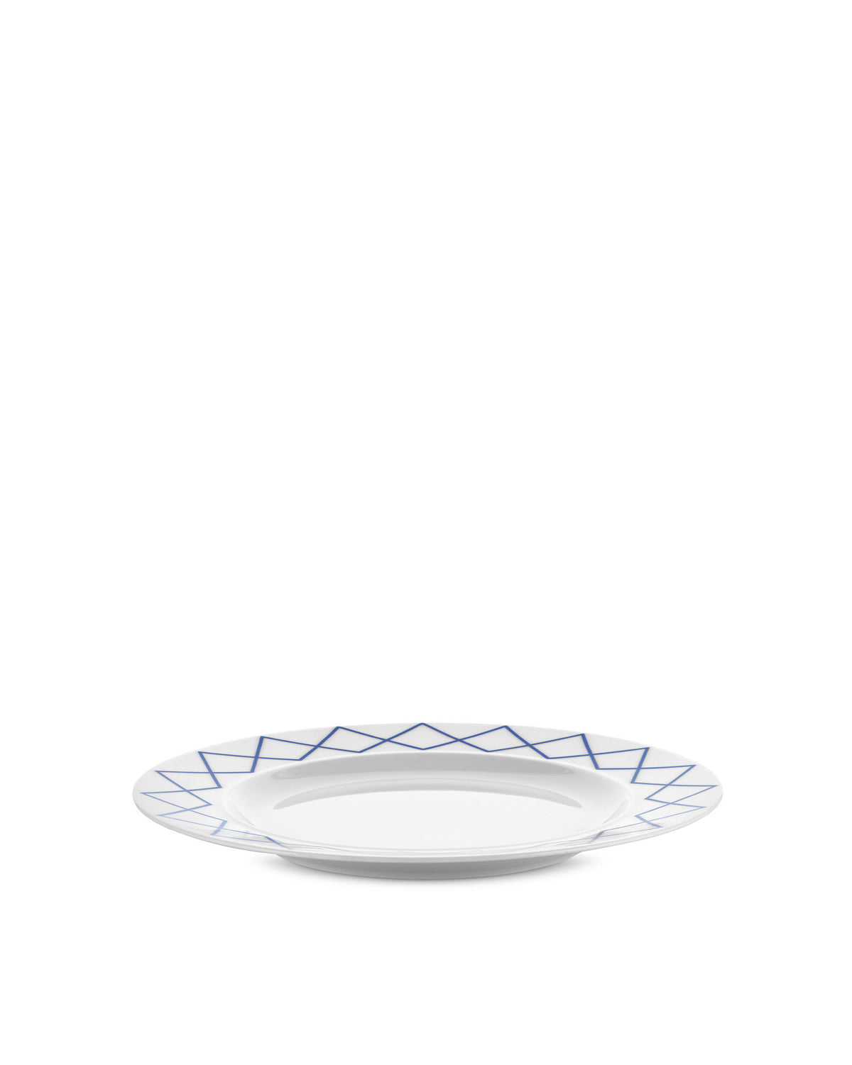 White dining plate by Alessi with a blue geometric zigzag pattern around the rim.