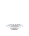 White soup bowl by Alessi, featuring a blue zigzag pattern around the rim.