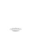 White ceramic saucer by Alessi, decorated with a blue geometric zigzag pattern.