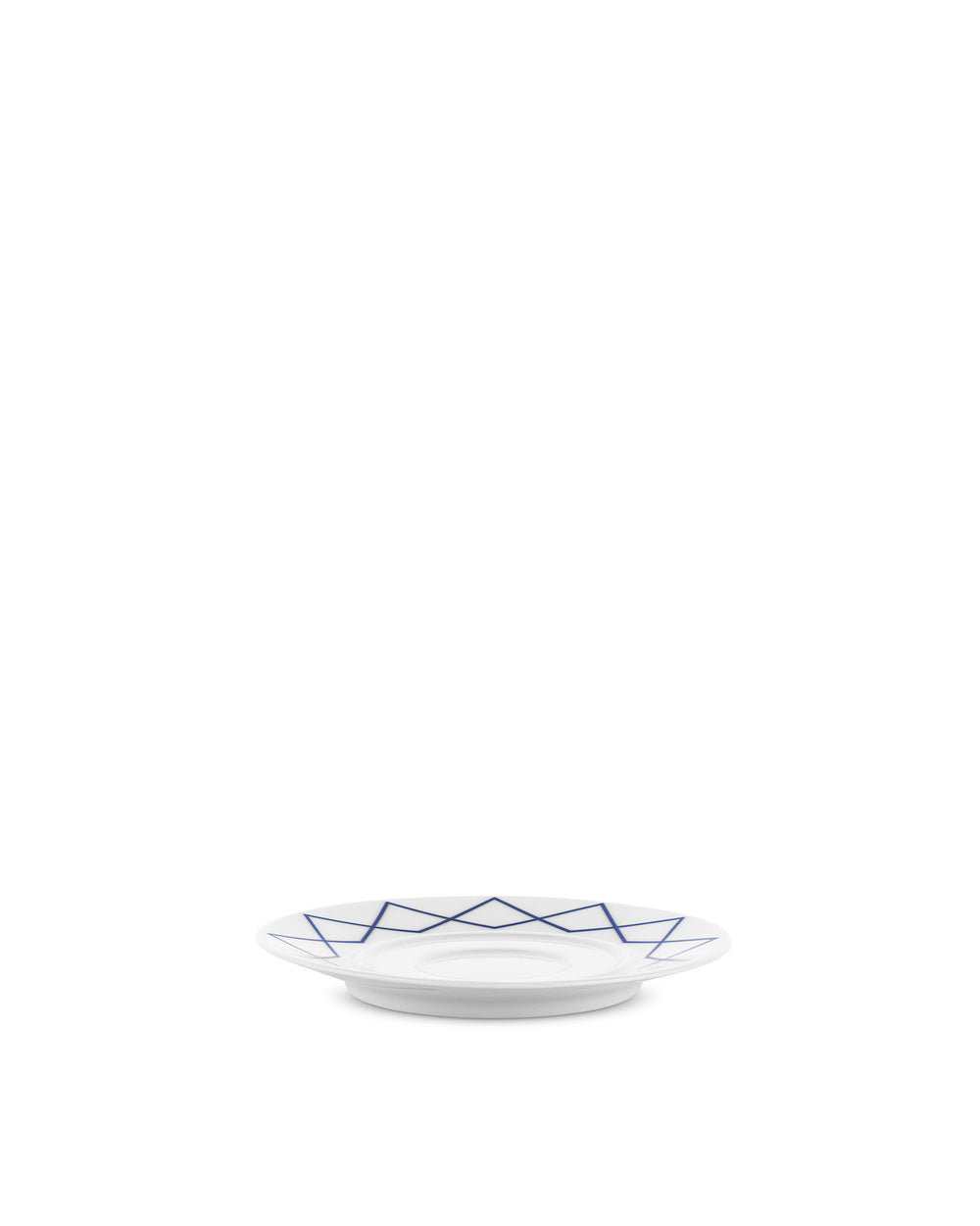 White porcelain saucer by Alessi with a blue geometric pattern, viewed from a low angle.