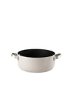 Light grey saucepan by Alessi with black non-stick interior and two silver loop handles.