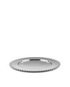 Silver metal tray by Alessi with a decorative scalloped edge, angled view.