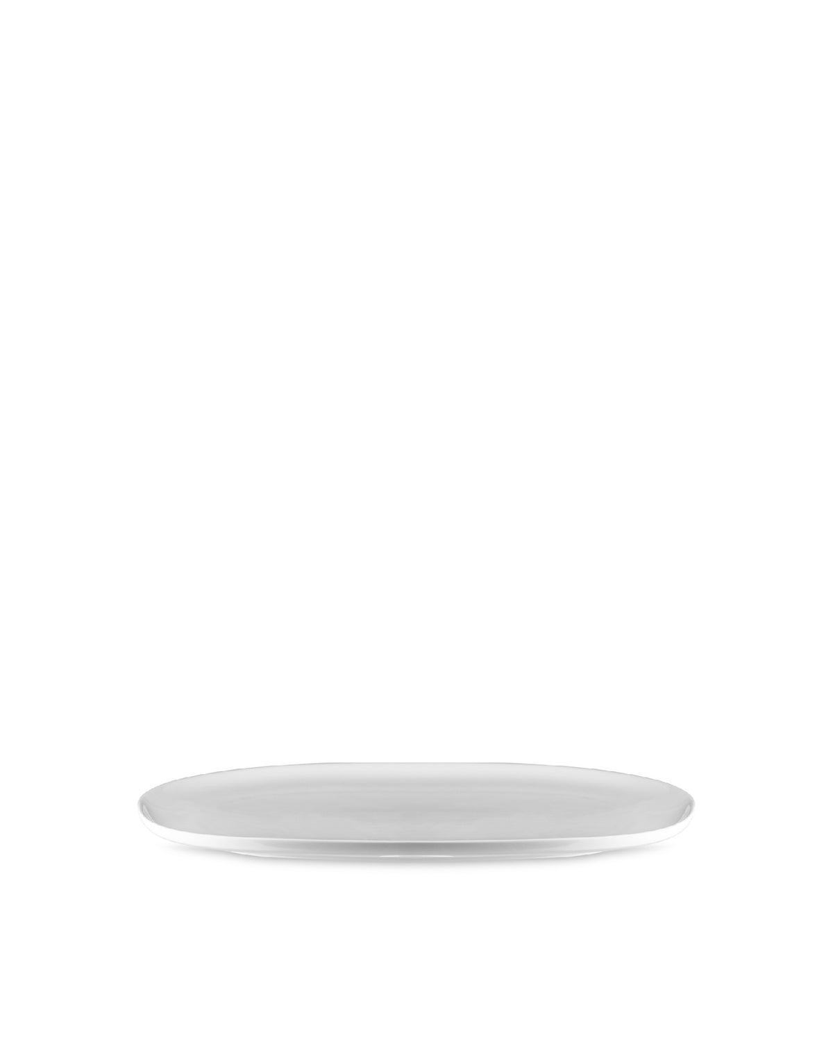 White oval serving plate by Alessi, resting on a white surface at a slight angle.