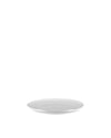 White round side plate by Alessi with a subtle, gently curved rim.