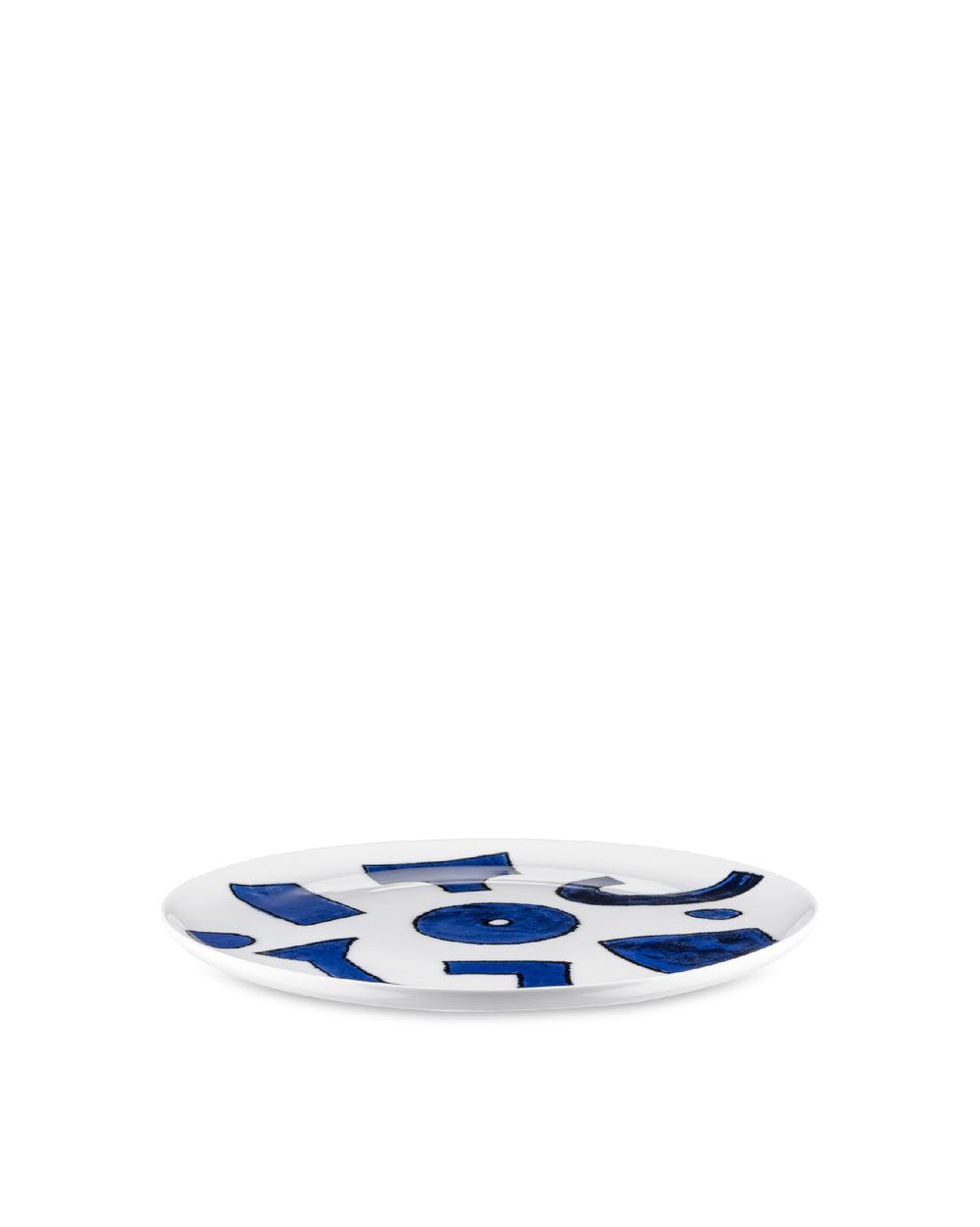 White plate by Alessi featuring a scattered blue abstract pattern.