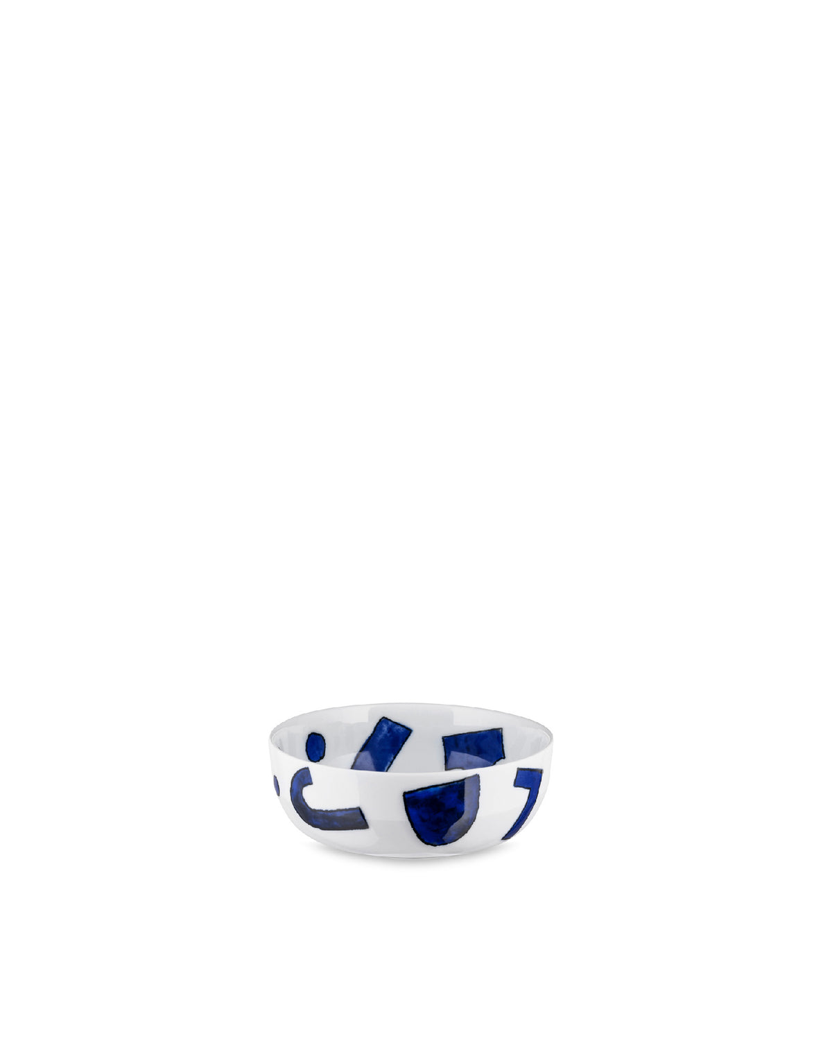 White ceramic bowl by Alessi with abstract blue geometric patterns, angled view.