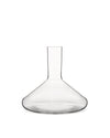 Clear glass decanter by Alessi, with a wide base and tall, narrow neck, standing upright.
