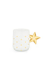 White mug with gold stars by Alessi, featuring a large golden star handle.