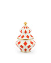 A white Christmas decorative container by Alessi, featuring red diamond patterns, gold trim, and a gold finial, shaped like a stylized tree.
