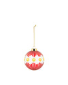 Red and white Christmas tree ornament by Alessi, with yellow polka dots, a gold cap, and hanging chain.