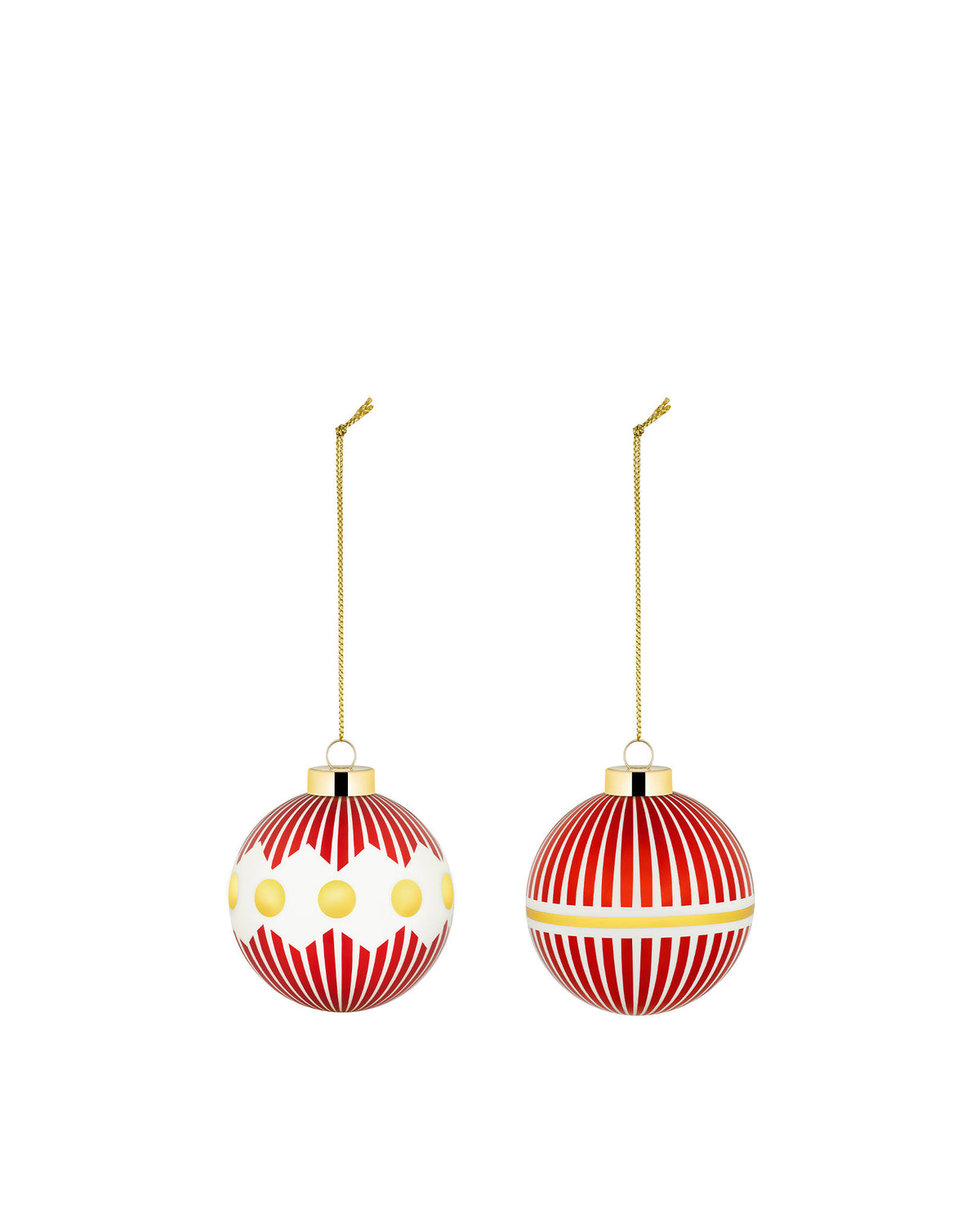 Two red and white Christmas tree ornaments by Alessi, one with yellow polka dots and the other with a gold stripe, hanging.