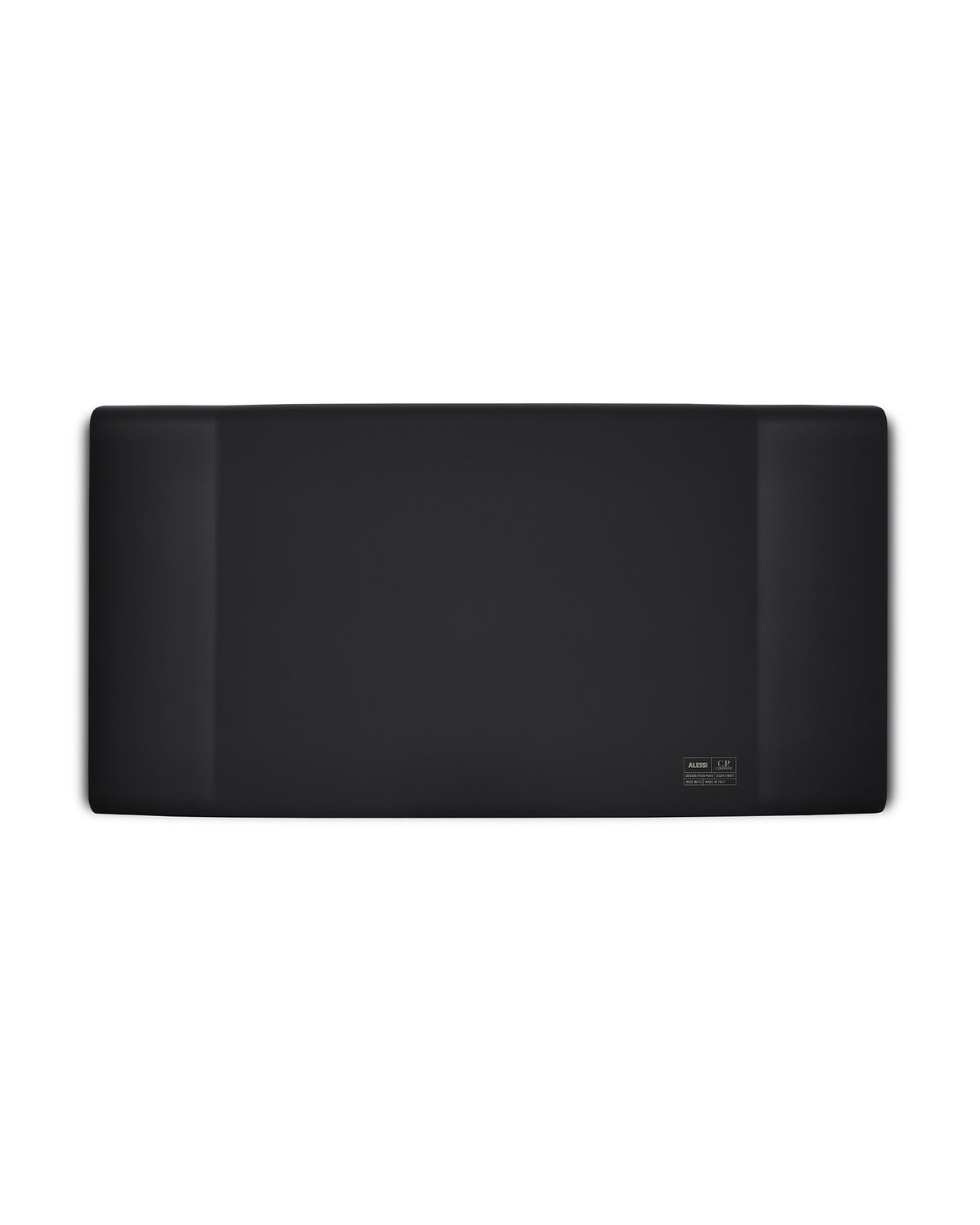 Black rectangular tray by Alessi with rounded edges and a brand label in the corner.