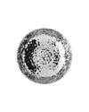 Silver faceted decorative bowl by Alessi with a geometric, crystalline surface and a hexagonal pattern at its center.