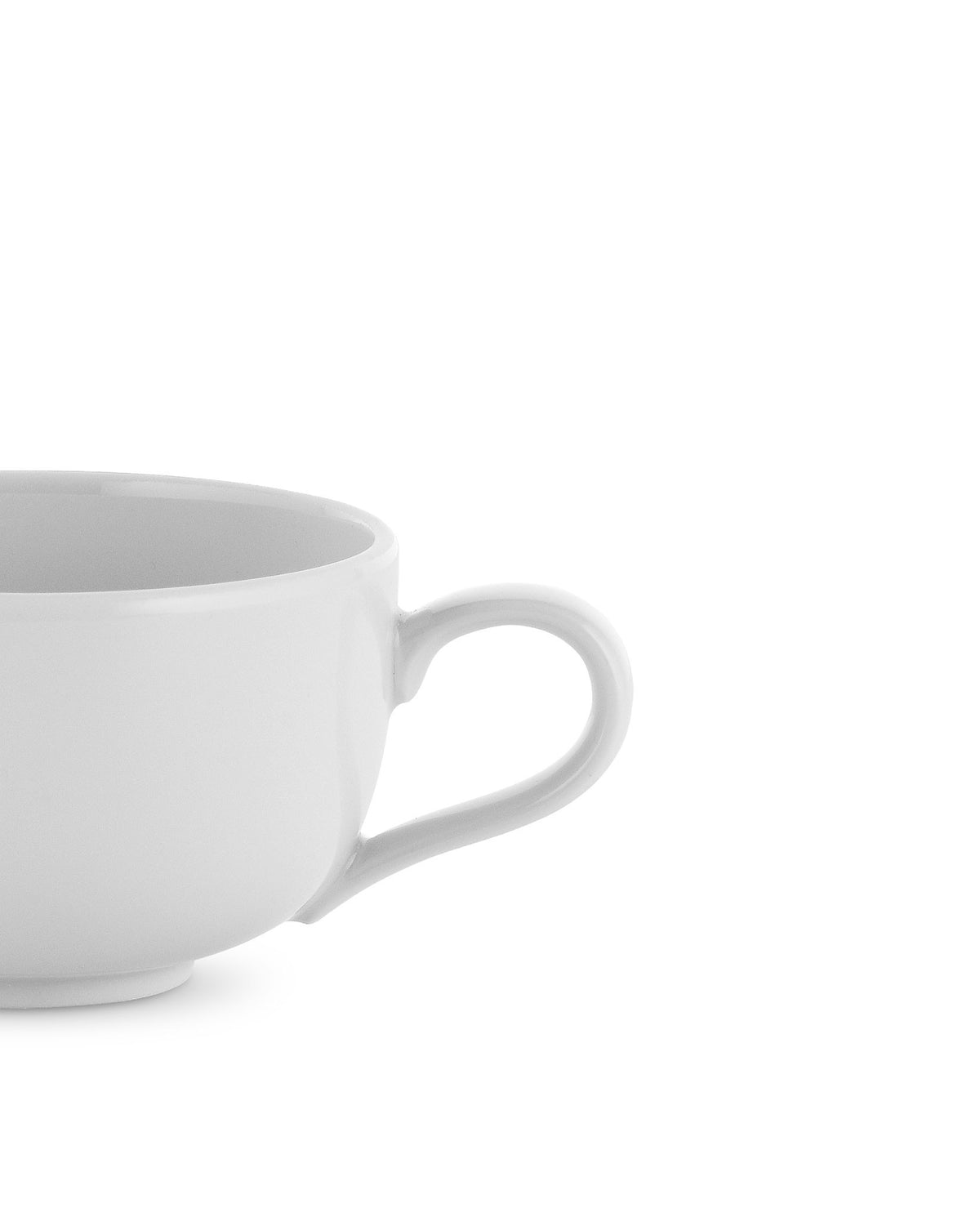 White cup by Alessi, with a clean design, visible handle, and cropped side view.