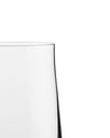Clear long drink glass by Alessi, showing the smooth, slightly tapered rim and side in a close-up.