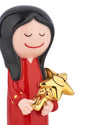 Figlio delle stelle ornamental figurine by Alessi, featuring a red-dressed figure holding a smiling gold star, cropped.