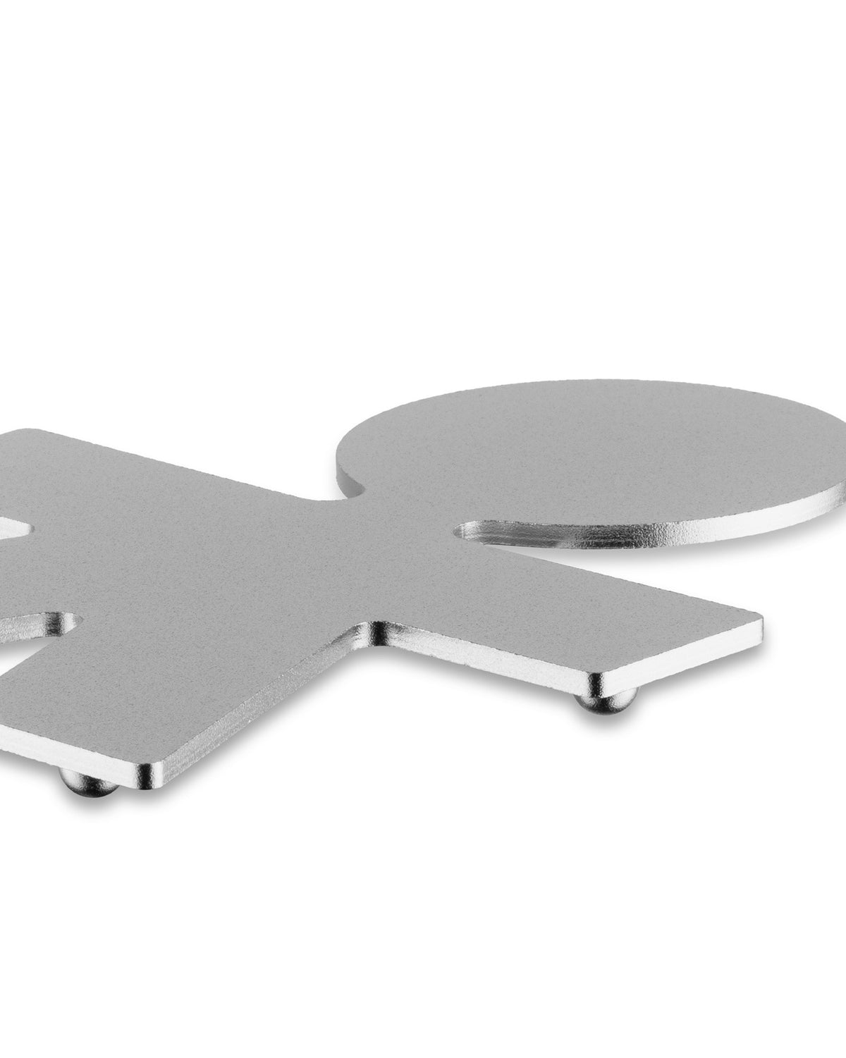 Silver metallic trivet by Alessi, a close-up of its stylized figure design with small feet.