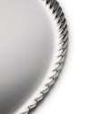 Silver metallic tray by Alessi with a decorative pleated edge, cropped view on a white background.