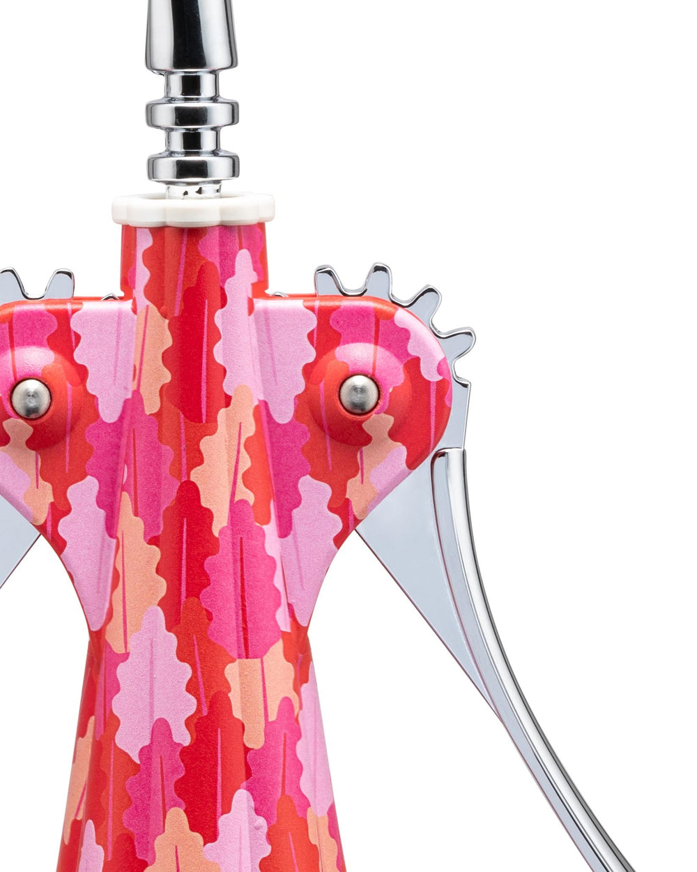 Red and pink patterned corkscrew by Alessi with an abstract leaf design and chrome metal accents, cropped view.