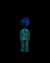 Blue and teal figurine corkscrew by Alessi, featuring a monster head and glowing skeleton body with red patterns.