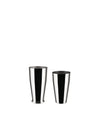Two shiny metal cocktail shakers by Alessi, one larger with a flared base, standing upright.