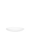 White serving plate by Alessi, oval and glossy, shown at an angle casting a soft shadow.
