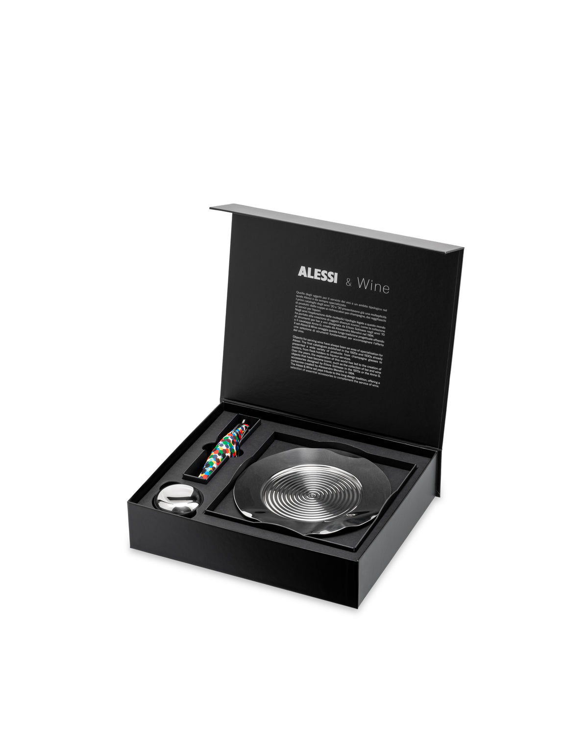 Wine mixology set in an open black presentation box by Alessi, with a colorful polka-dot corkscrew, silver pourer, and a spiral-patterned coaster.