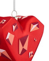 Red faceted heart-shaped Christmas tree ornament by Alessi, decorated with geometric patterns in pink, orange, and burgundy.