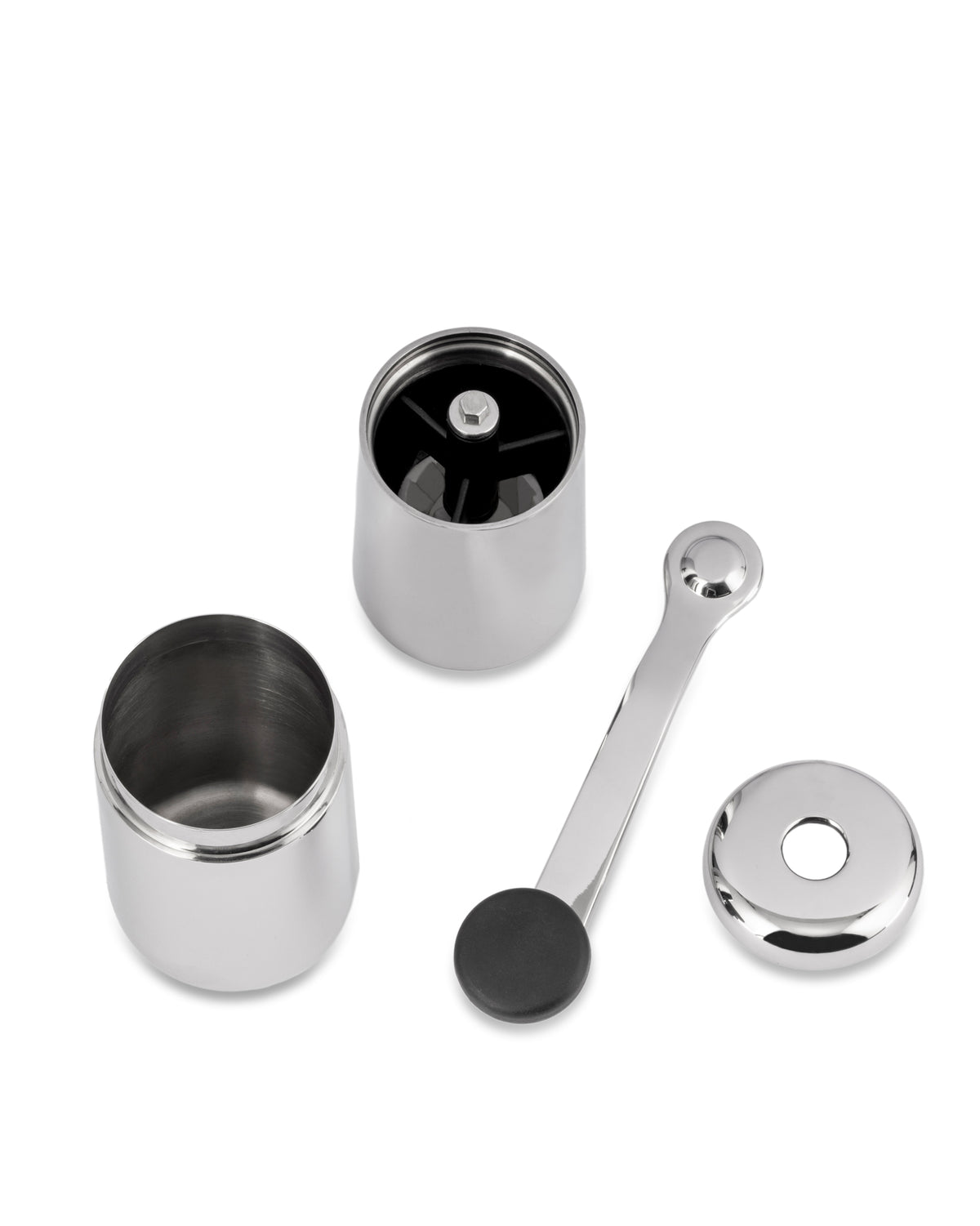 Stainless steel coffee grinder by Alessi, disassembled into four polished components on a white background.