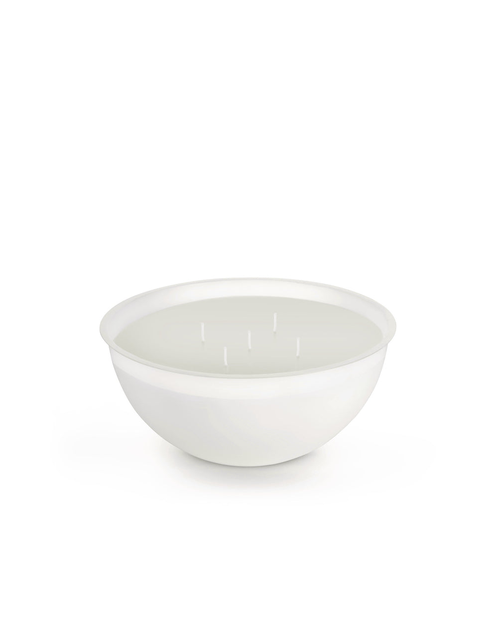 White five-wick candle by Alessi in a wide, shallow white bowl, shown from a slightly elevated angle.