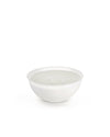 White multi-wick candle in a bowl by Alessi, featuring four wicks in a minimalist design.