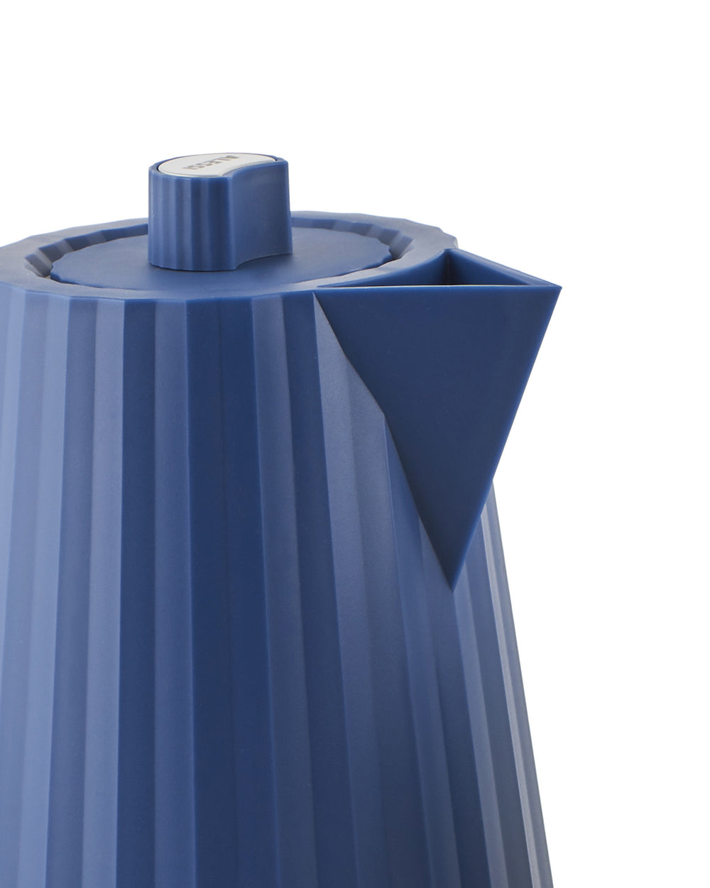 Blue electric kettle by Alessi with a pleated texture, geometric spout, and white lid button in a cropped view.