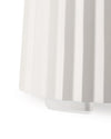 White pleated Plissé blender by Alessi, with a prominent vertical ribbed texture, cropped side view.