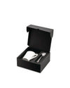White mug and spoon gift set by Alessi in an open black presentation box with a heart-shaped spoon.