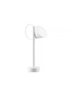 White Tsumiki table lamp by Alessi with a conical shade, cylindrical stem, round base, and a white cable loop.