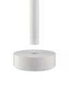 White Tsumiki lamp by Alessi, featuring a cylindrical part above a round base with a central opening.