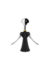 Black and chrome-plated corkscrew by Alessi with a smiling figural head and skirted base, on white.