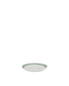White saucer by Alessi, featuring three textured green stripes around the rim, presented at an angle.