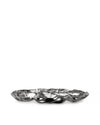 Metallic wavy serving plate by Alessi, with a highly reflective, irregular crumpled surface and multiple compartments on a white background.