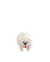 Bubbly textured white dog figure by Alessi with black dot eyes, nose, and red tongue.