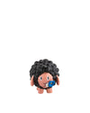 Black curly sheep figurine with a pink face by Alessi, holding a blue and white flower.