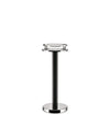 Black and chrome modern stand by Alessi with a textured top tray, arched rails, and a polished round base.