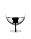 Chrome-plated steel fruit bowl by Alessi, with two handles, on a dark stem and flat circular base.