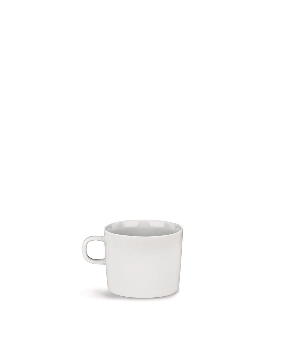 White cup by Alessi with a simple, modern design and handle, casting a shadow.